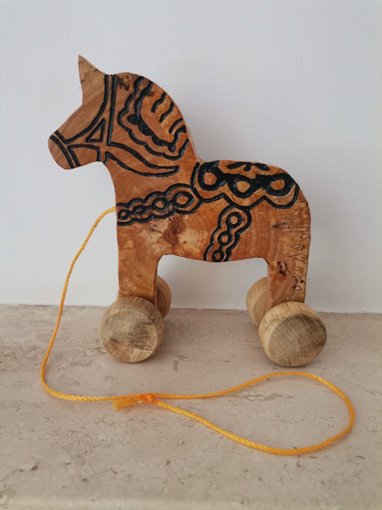 Swedish Dala horse on string and wheels, hard-caved Dala horse on wheels, handmade wooden Swedish Dala Horse